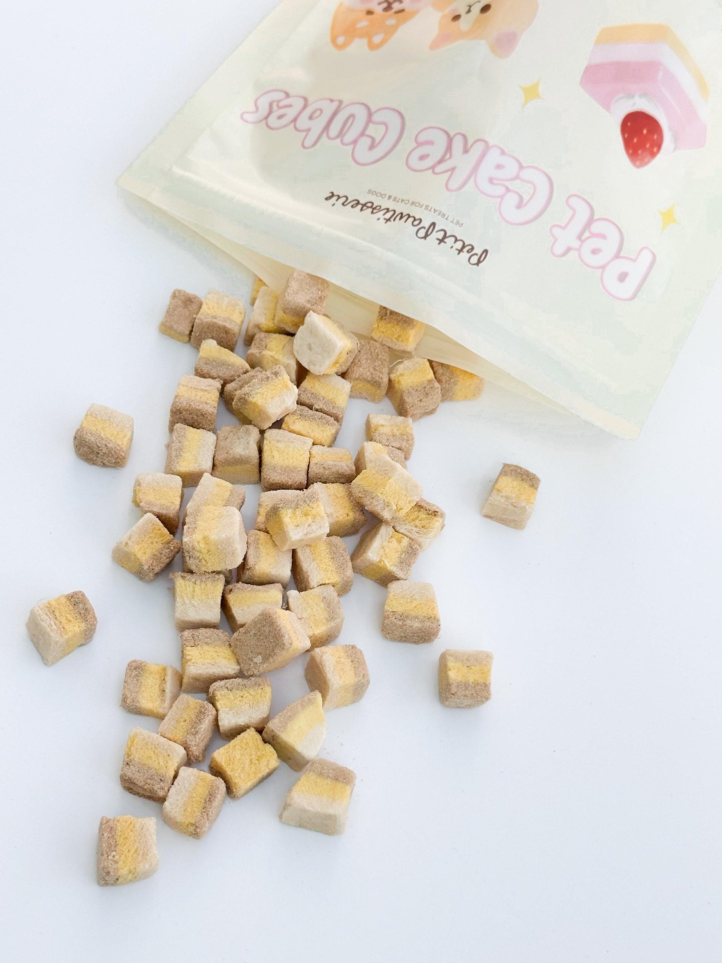 Petit Pawtisserie freeze-dried cake cube pet treats for cats and dogs – soft bite sized snacks with 3 layers of flavor