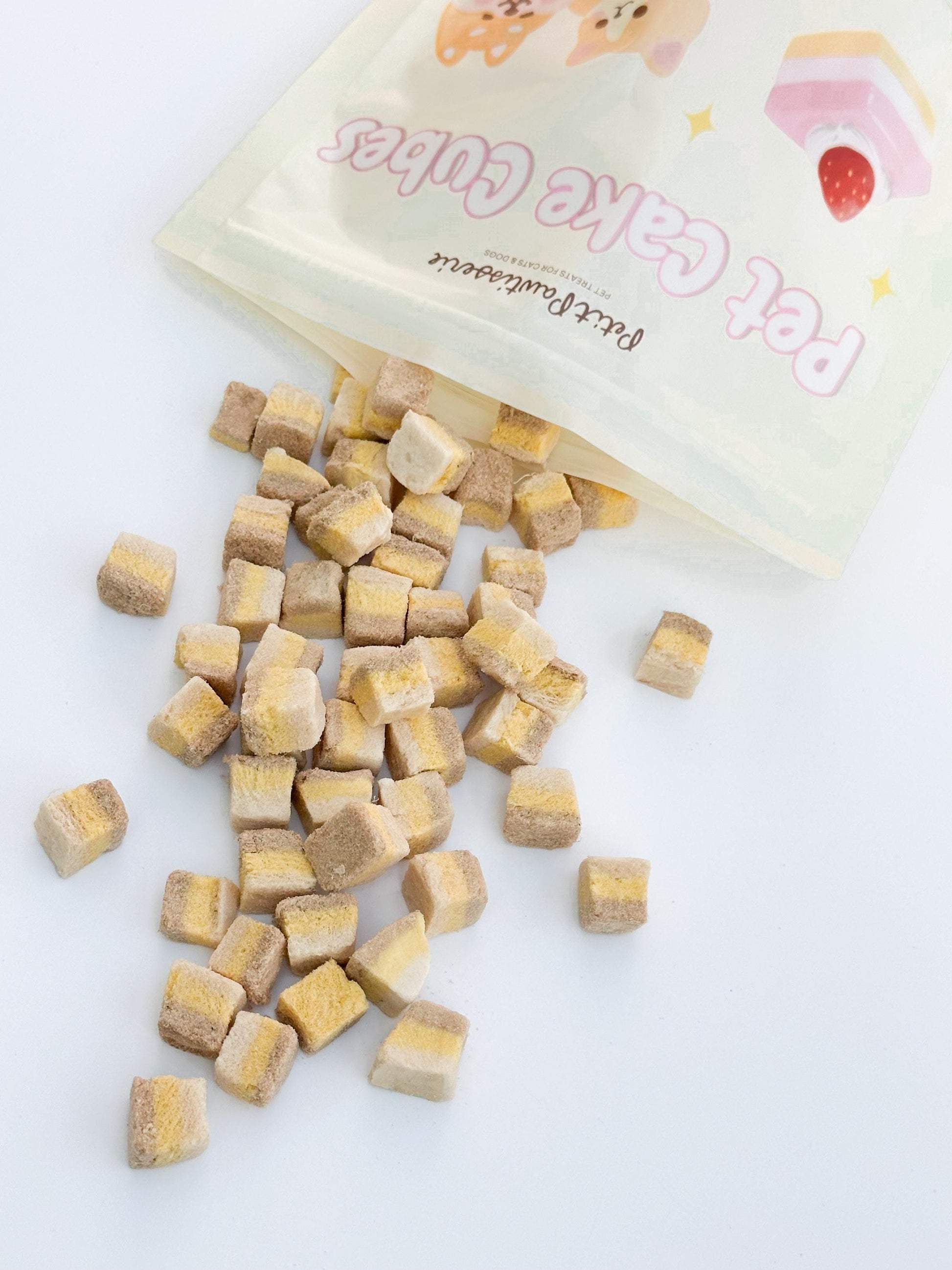 Petit Pawtisserie freeze-dried cake cube pet treats for cats and dogs – soft bite sized snacks with 3 layers of flavor